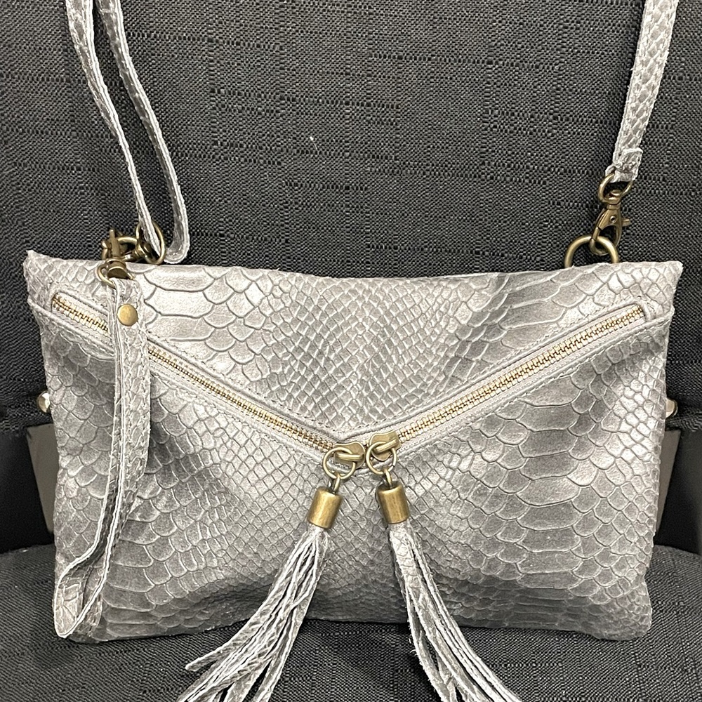Italian leather shoulder bag with tassels